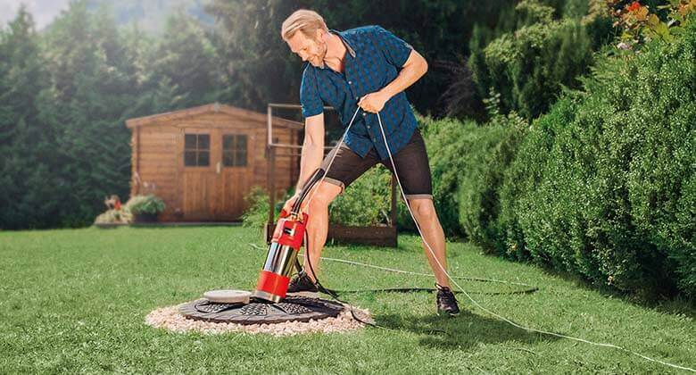 man using a submersible pressure pump