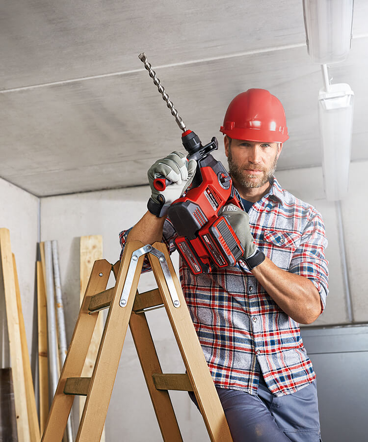  A man working with an impact drill